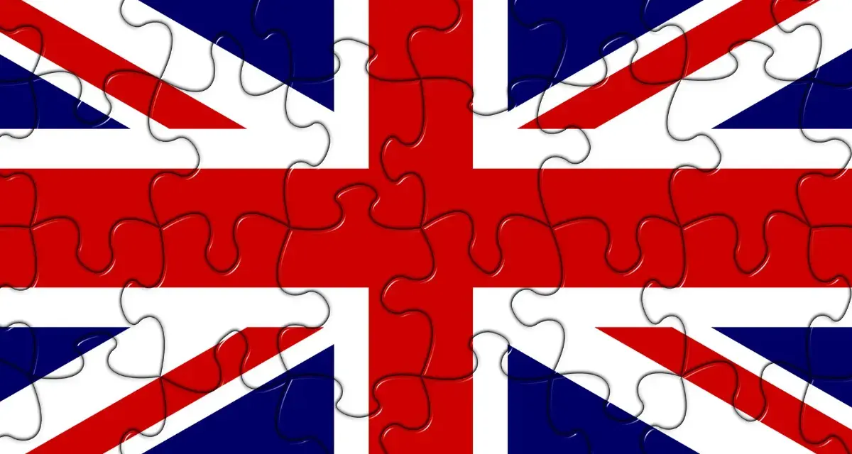 Union Jack som pussel. En symbol för Storbritannien, där varje bit representerar en del av landets historia. Bindestreck engelska.