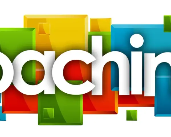 Stora vita bokstäver bildar ordet "Coaching!" framför en bakgrund av färgglada, glänsande kuber. Det här är vad coach betyder.